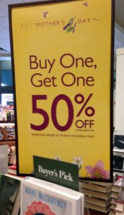 Buy one get one sign